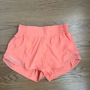 Orange high waisted Hotty hot 2.5” shorts